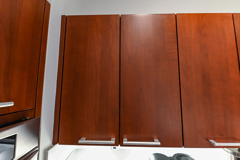 Poggenpohl Brown Toned Transitional Kitchen with Marble Countertops and Appliances