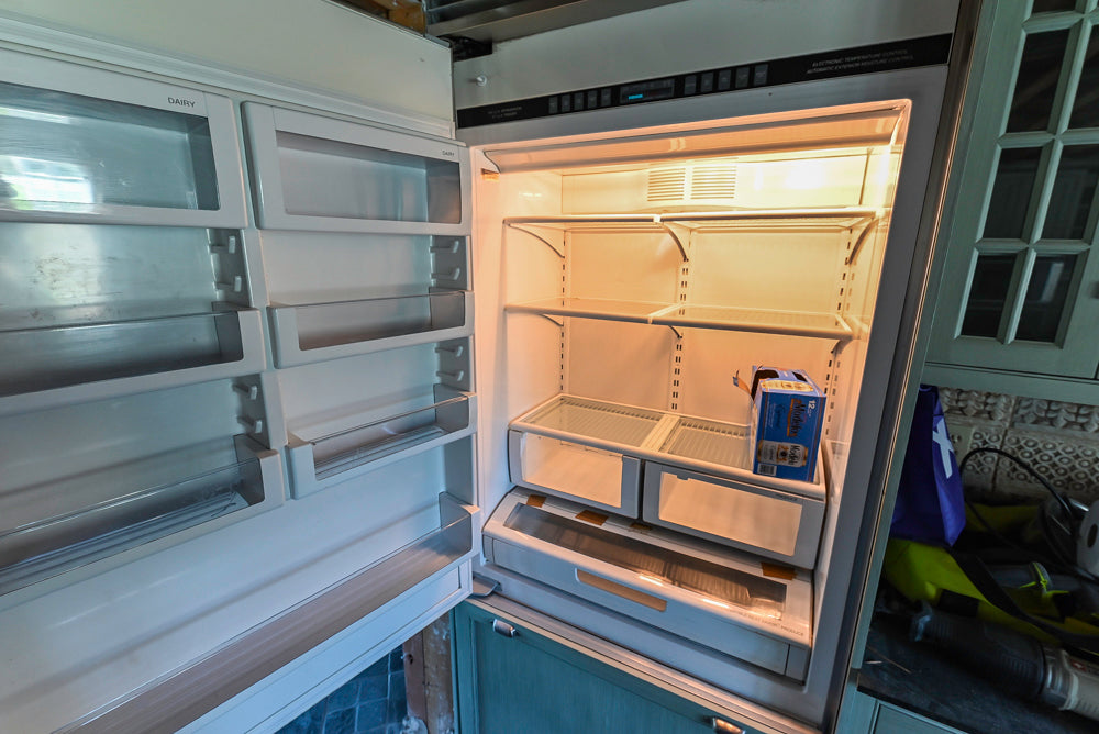 Traditional Washed Out Light Green Kitchen with Island, Granite Countertops and Viking Appliances