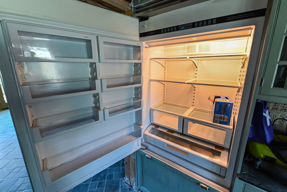 Traditional Washed Out Light Green Kitchen with Island, Granite Countertops and Viking Appliances
