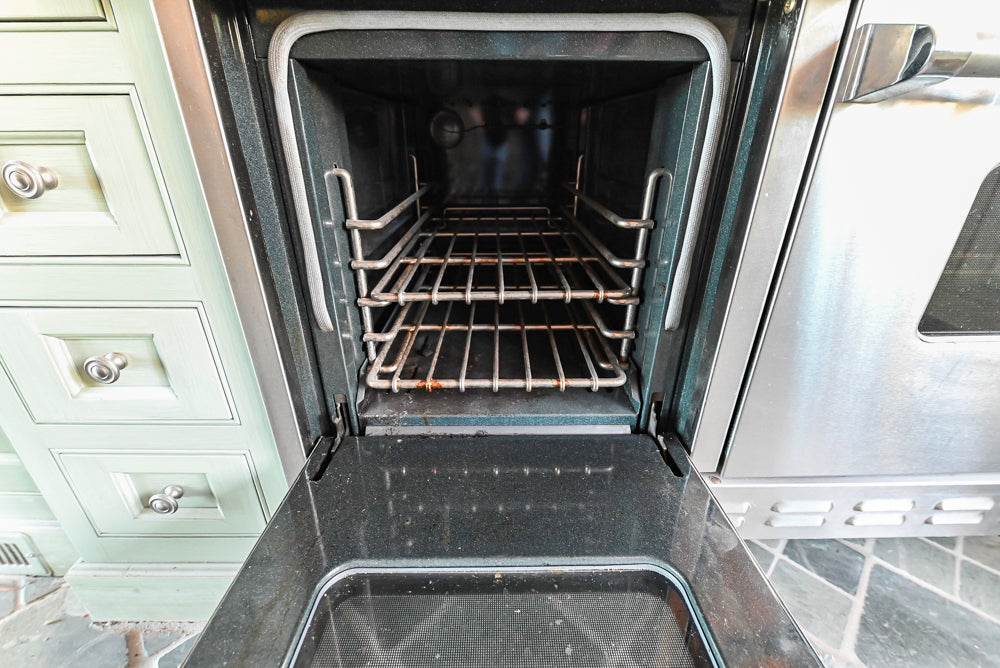 Traditional Washed Out Light Green Kitchen with Island, Granite Countertops and Viking Appliances