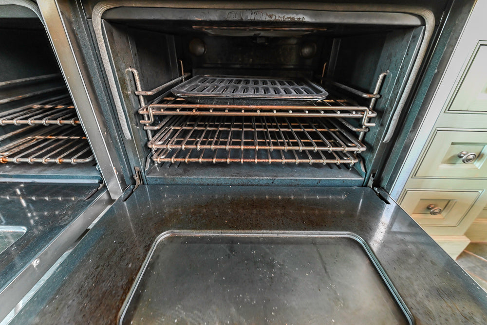 Traditional Washed Out Light Green Kitchen with Island, Granite Countertops and Viking Appliances