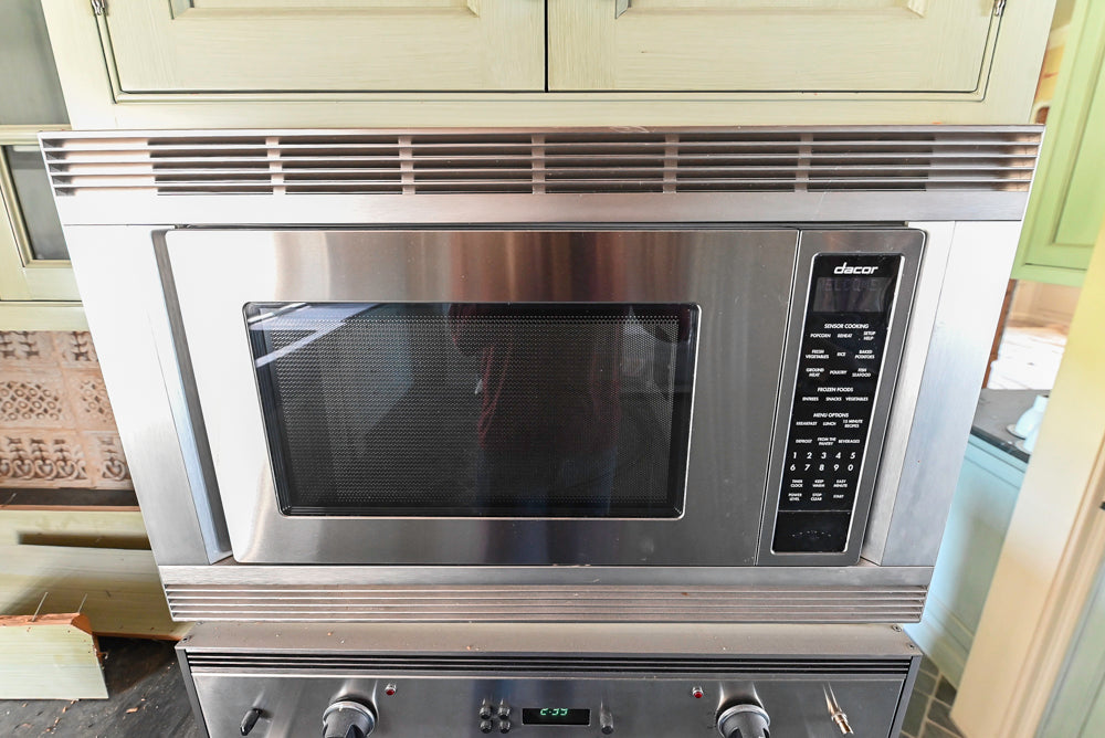 Traditional Washed Out Light Green Kitchen with Island, Granite Countertops and Viking Appliances
