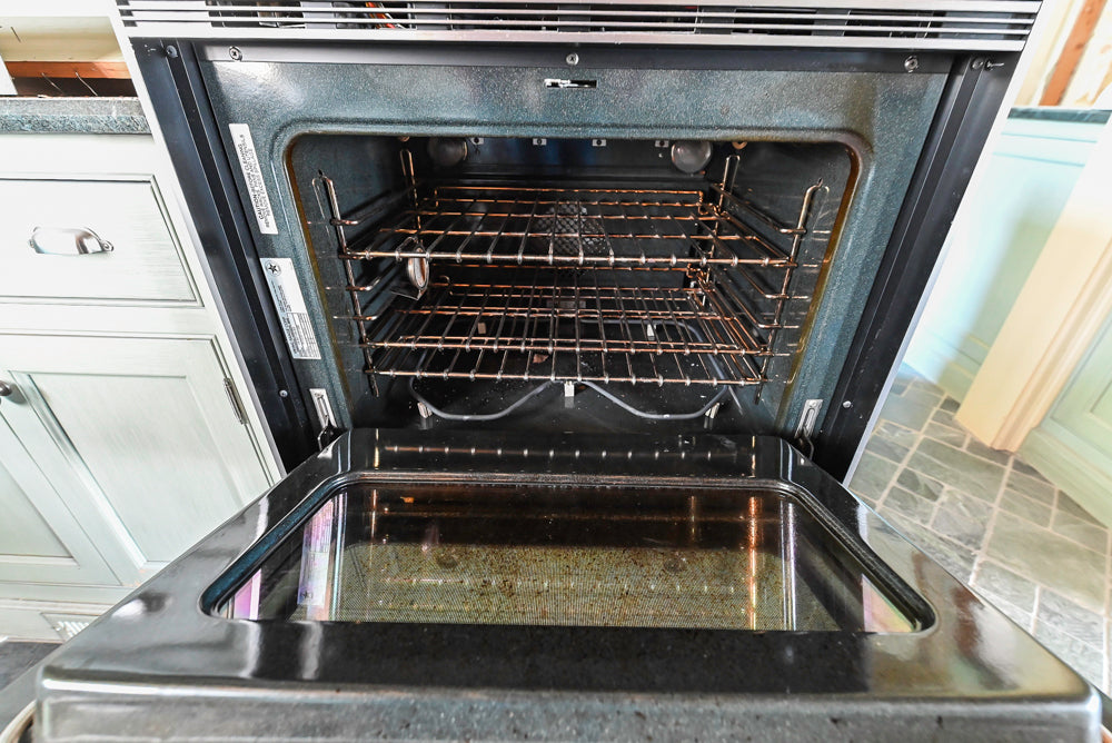 Traditional Washed Out Light Green Kitchen with Island, Granite Countertops and Viking Appliances