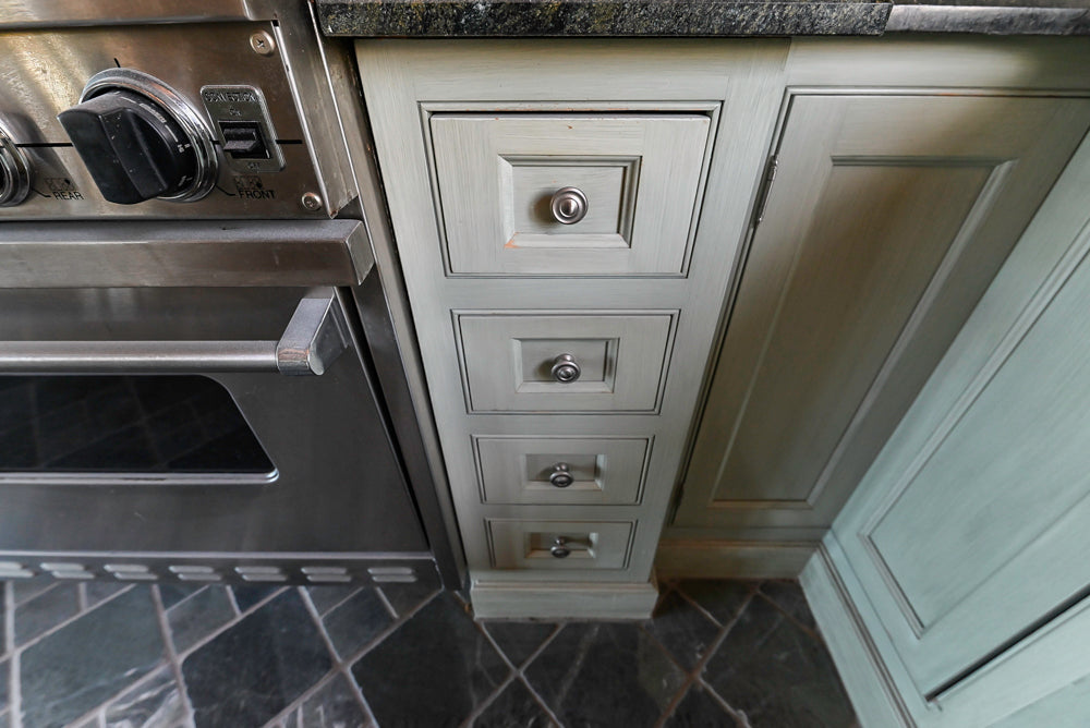 Traditional Washed Out Light Green Kitchen with Island, Granite Countertops and Viking Appliances