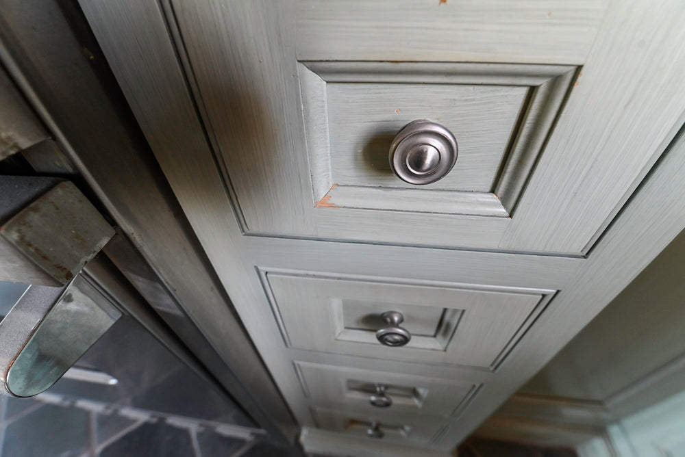 Traditional Washed Out Light Green Kitchen with Island, Granite Countertops and Viking Appliances