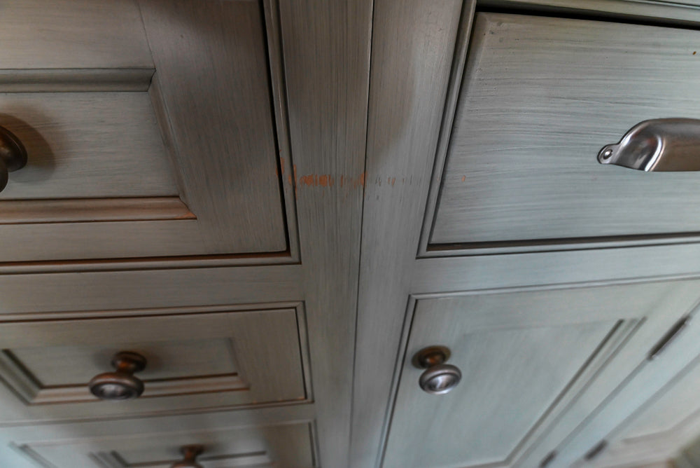 Traditional Washed Out Light Green Kitchen with Island, Granite Countertops and Viking Appliances