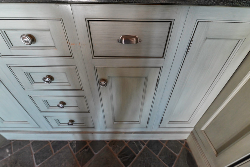 Traditional Washed Out Light Green Kitchen with Island, Granite Countertops and Viking Appliances