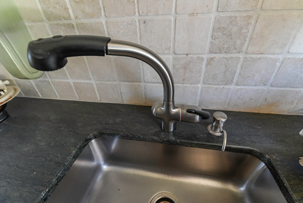 Traditional Washed Out Light Green Butler's Pantry with Granite Countertops and Viking Appliances