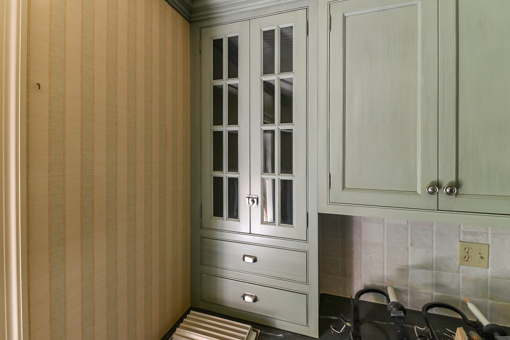 Traditional Washed Out Light Green Butler's Pantry with Granite Countertops and Viking Appliances