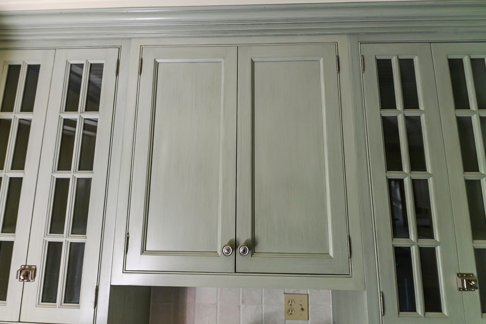 Traditional Washed Out Light Green Butler's Pantry with Granite Countertops and Viking Appliances