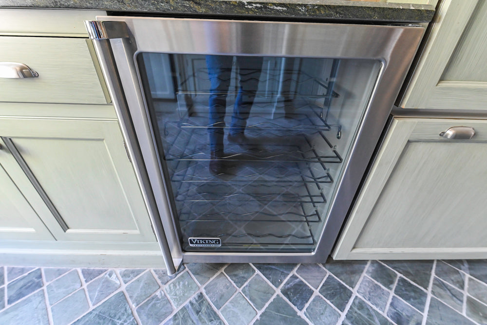Traditional Washed Out Light Green Butler's Pantry with Granite Countertops and Viking Appliances