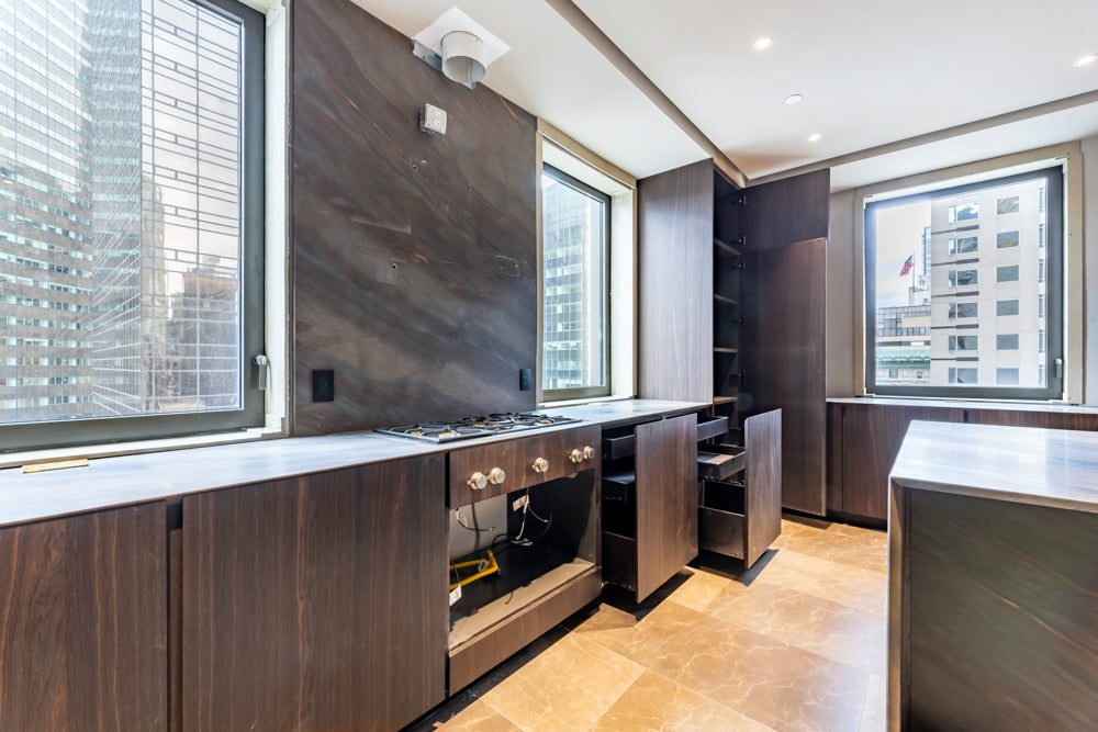 minotticucine Modern Classic Dark Brown Kitchen with Stone Countertops and Gaggenau Refrigerators
