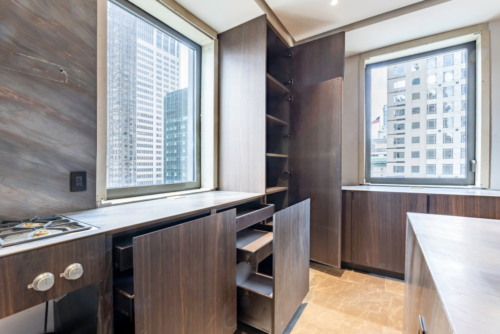 minotticucine Modern Classic Dark Brown Kitchen with Stone Countertops and Gaggenau Refrigerators