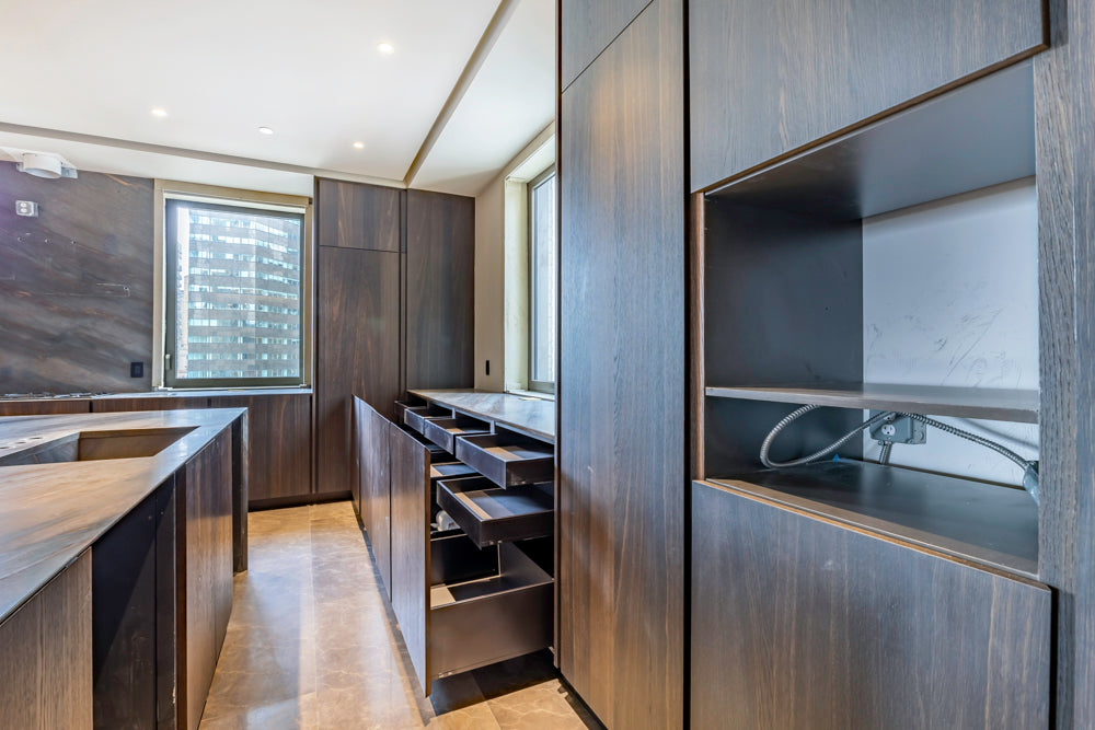 minotticucine Modern Classic Dark Brown Kitchen with Stone Countertops and Gaggenau Refrigerators