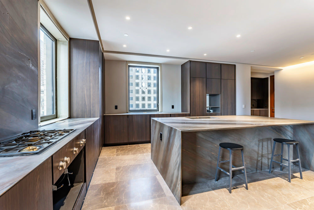 minotticucine Modern Classic Dark Brown Kitchen with Stone Countertops and Gaggenau Refrigerators