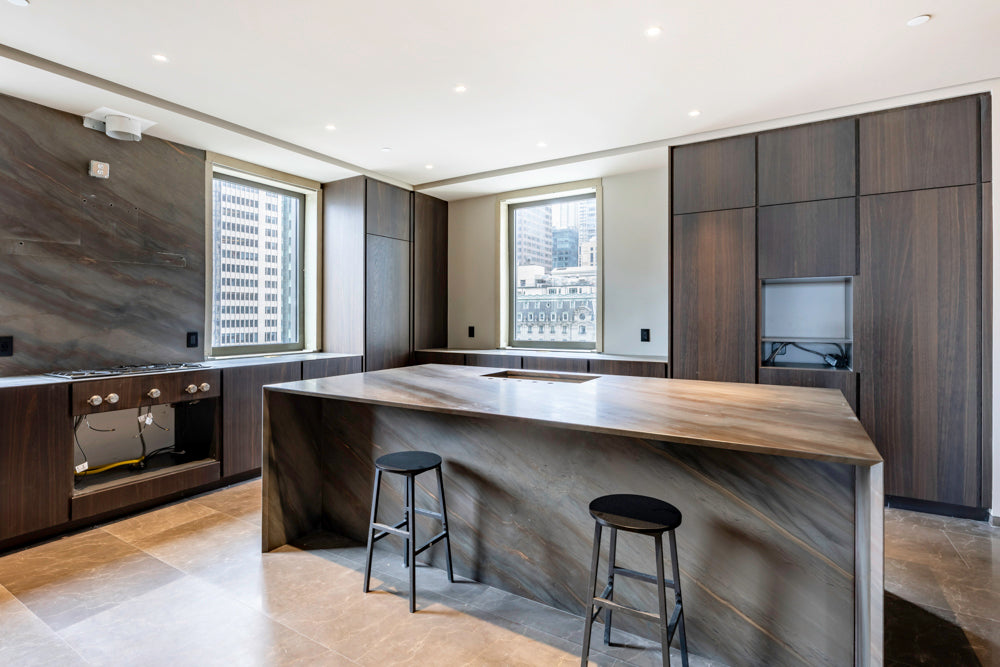minotticucine Modern Classic Dark Brown Kitchen with Stone Countertops and Gaggenau Refrigerators