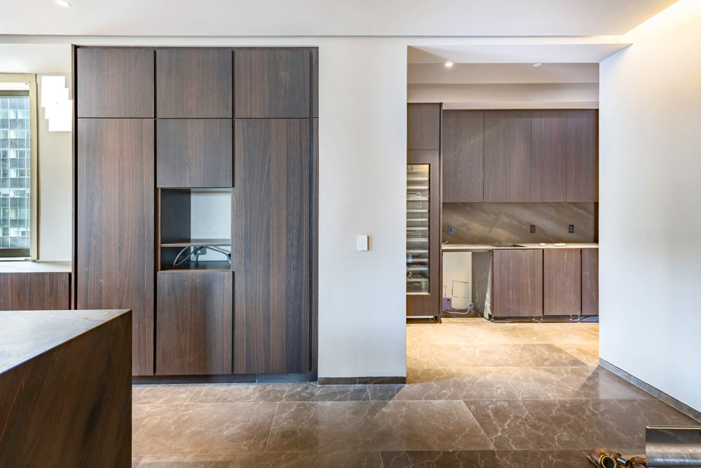 minotticucine Modern Classic Dark Brown Kitchen with Stone Countertops and Gaggenau Refrigerators
