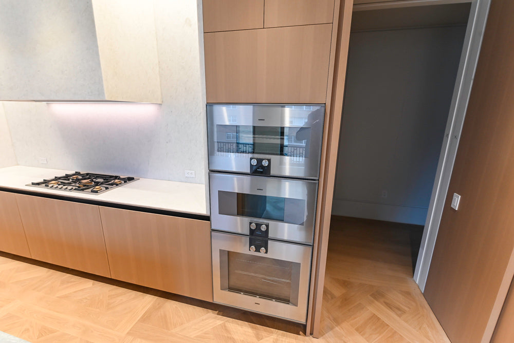 Molteni & C Dada Modern White Oak Kitchen with Marble Countertops & Gaggenau Appliances