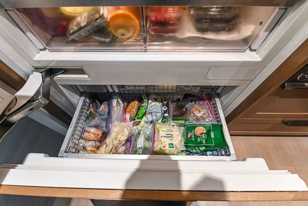 Stevali Brown Oak Transitional Kitchen with Stone Countertops and Luxe Appliances