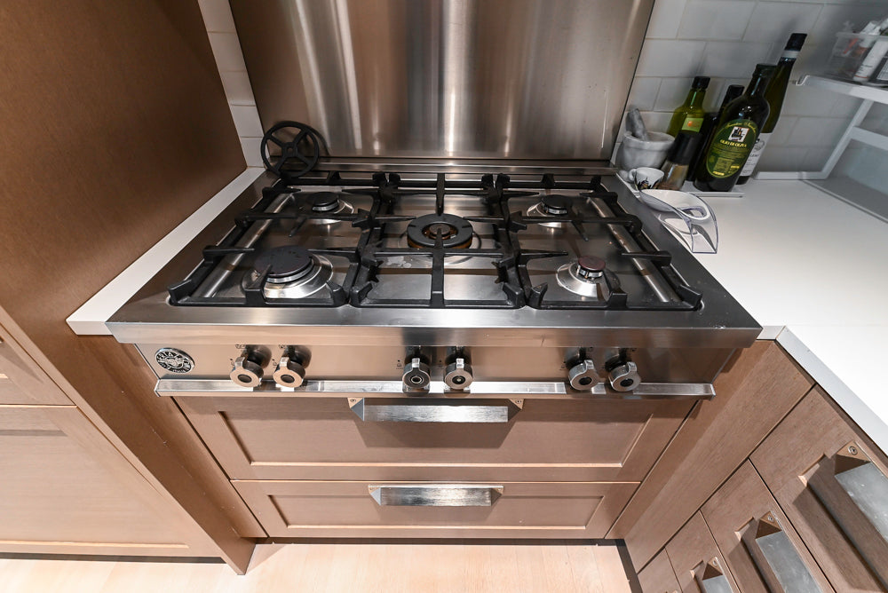 Stevali Brown Oak Transitional Kitchen with Stone Countertops and Luxe Appliances