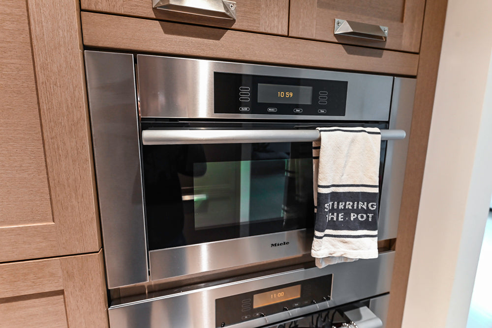 Stevali Brown Oak Transitional Kitchen with Stone Countertops and Luxe Appliances