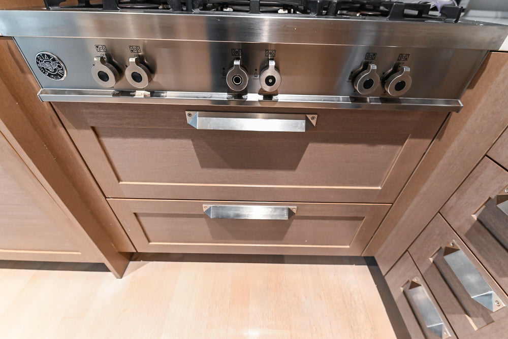 Stevali Brown Oak Transitional Kitchen with Stone Countertops and Luxe Appliances