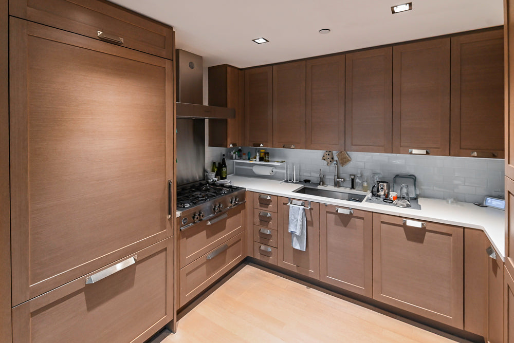 Stevali Brown Oak Transitional Kitchen with Stone Countertops and Luxe Appliances