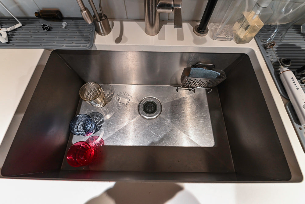 Stevali Brown Oak Transitional Kitchen with Stone Countertops and Luxe Appliances