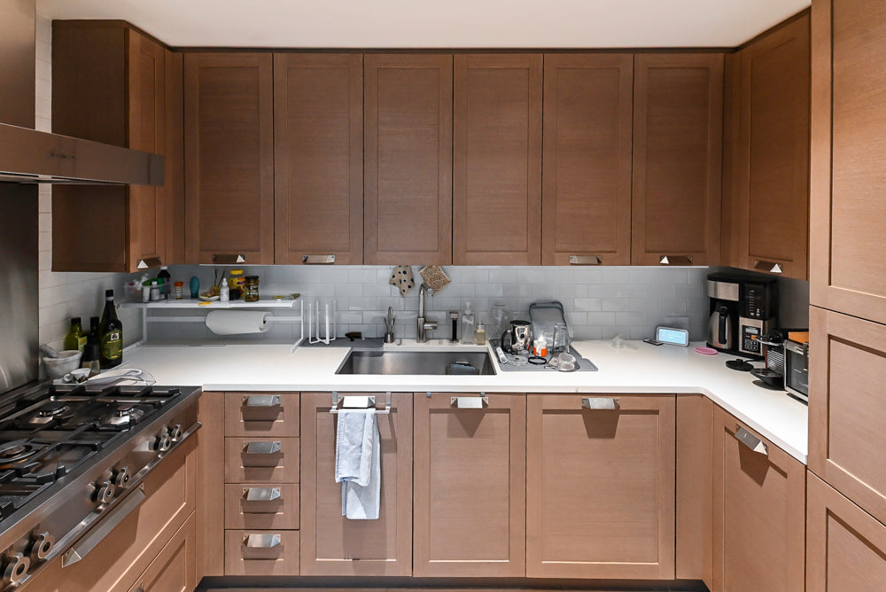 Stevali Brown Oak Transitional Kitchen with Stone Countertops and Luxe Appliances