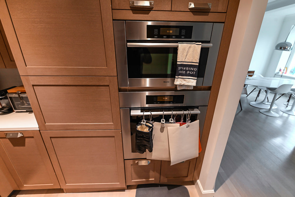 Stevali Brown Oak Transitional Kitchen with Stone Countertops and Luxe Appliances