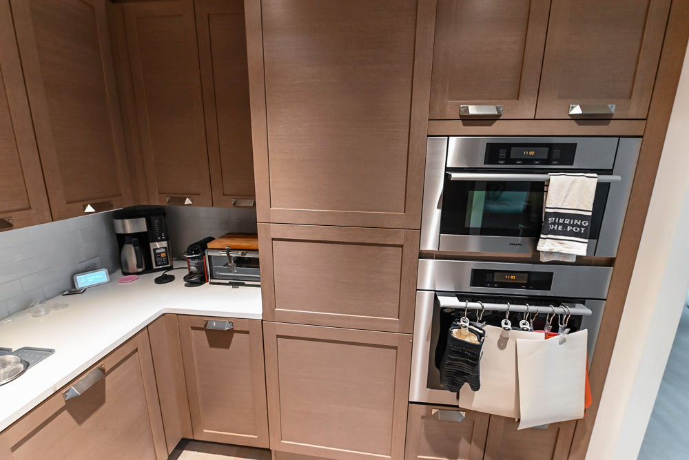 Stevali Brown Oak Transitional Kitchen with Stone Countertops and Luxe Appliances