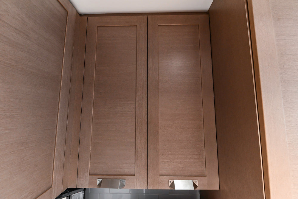 Stevali Brown Oak Transitional Kitchen with Stone Countertops and Luxe Appliances