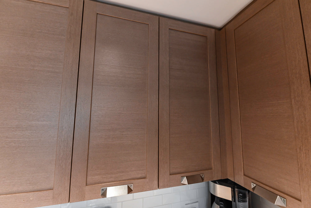 Stevali Brown Oak Transitional Kitchen with Stone Countertops and Luxe Appliances