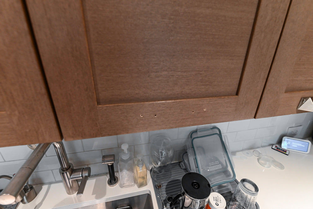 Stevali Brown Oak Transitional Kitchen with Stone Countertops and Luxe Appliances