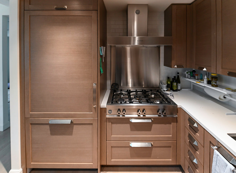 Stevali Brown Oak Transitional Kitchen with Stone Countertops and Luxe Appliances