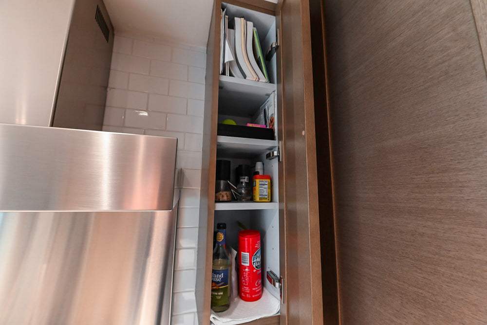 Stevali Brown Oak Transitional Kitchen with Stone Countertops and Luxe Appliances