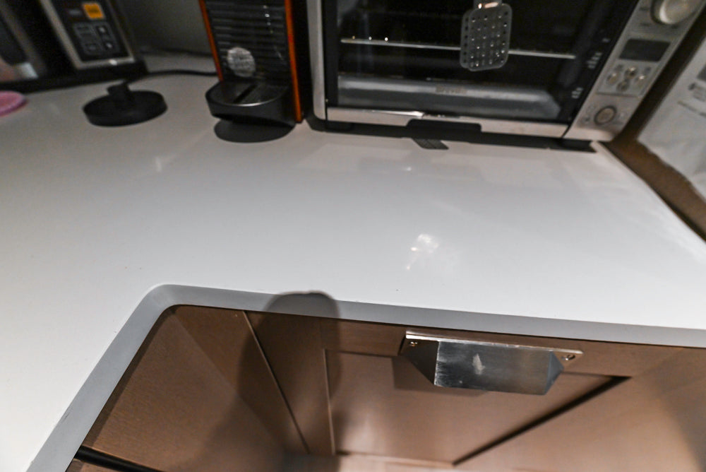 Stevali Brown Oak Transitional Kitchen with Stone Countertops and Luxe Appliances