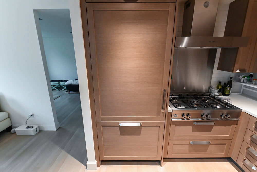 Stevali Brown Oak Transitional Kitchen with Stone Countertops and Luxe Appliances