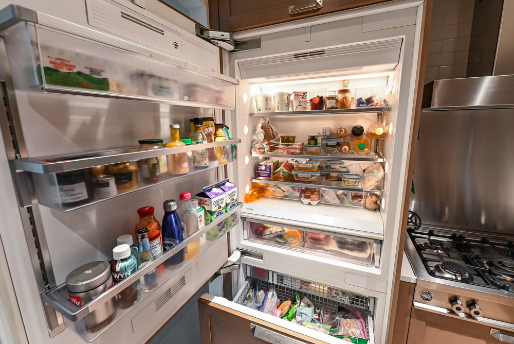 Stevali Brown Oak Transitional Kitchen with Stone Countertops and Luxe Appliances