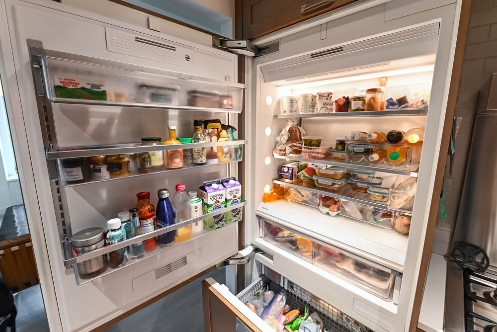 Stevali Brown Oak Transitional Kitchen with Stone Countertops and Luxe Appliances