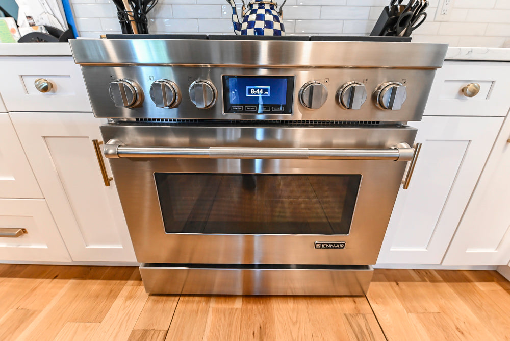 St. Martin Transitional White Kitchen with Island, White Quartz Countertops & JennAir Appliances