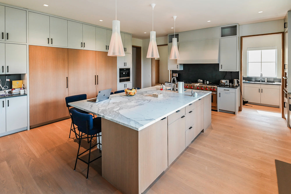 Custom Modern Two-Tone Kitchen with Marble Top Island and Sub-Zero & Wolf Appliances
