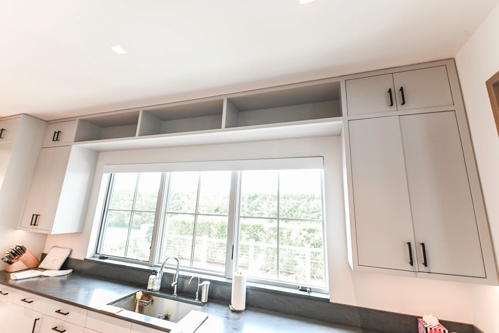 Custom Modern Two-Tone Kitchen with Marble Top Island and Sub-Zero & Wolf Appliances