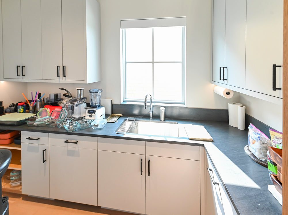 Custom Modern White Butler's Pantry with Stone Countertops & Sink