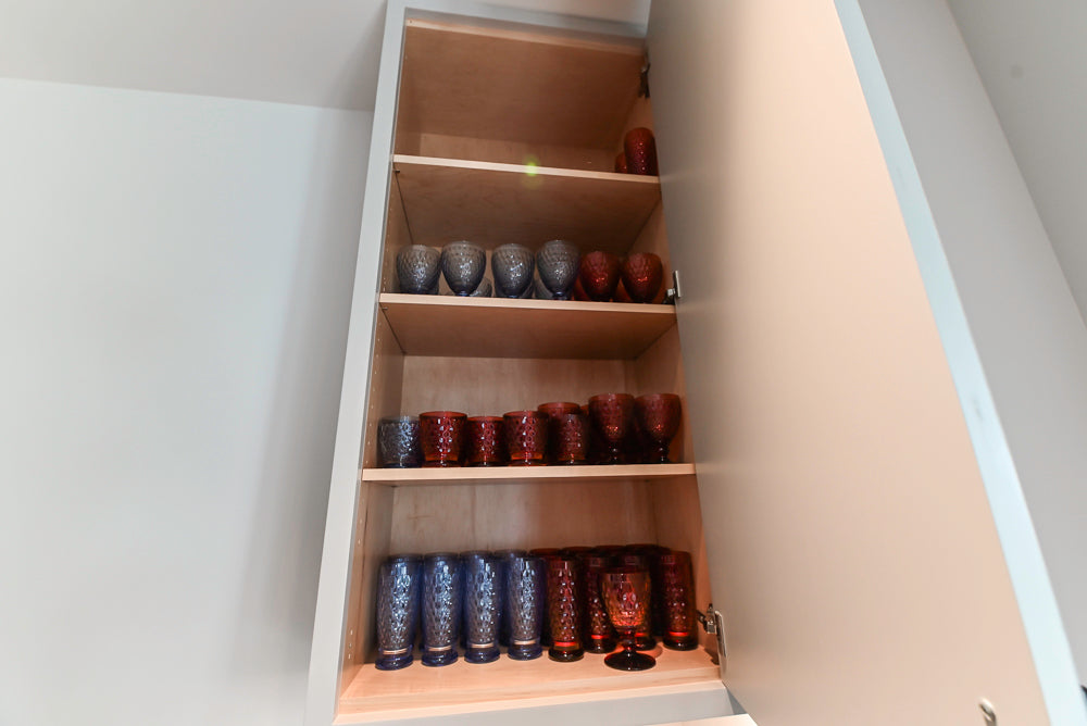 Custom Modern Light Grey Wet Bar with Black Stone Countertops & Appliances