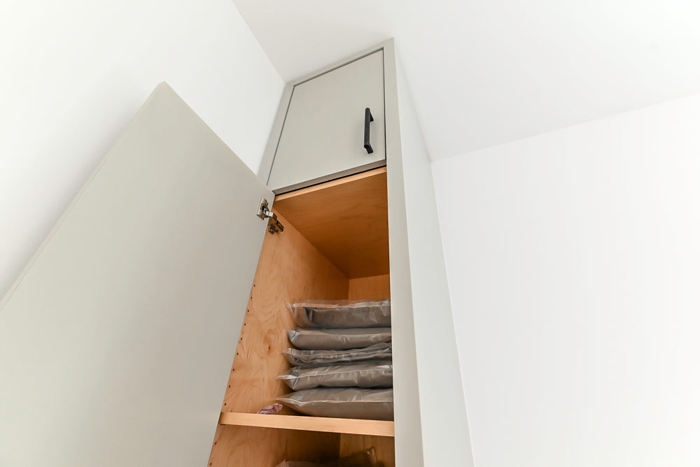 Custom Modern Light Grey Pantry with White Stone Countertops and Stainless Steel Sink