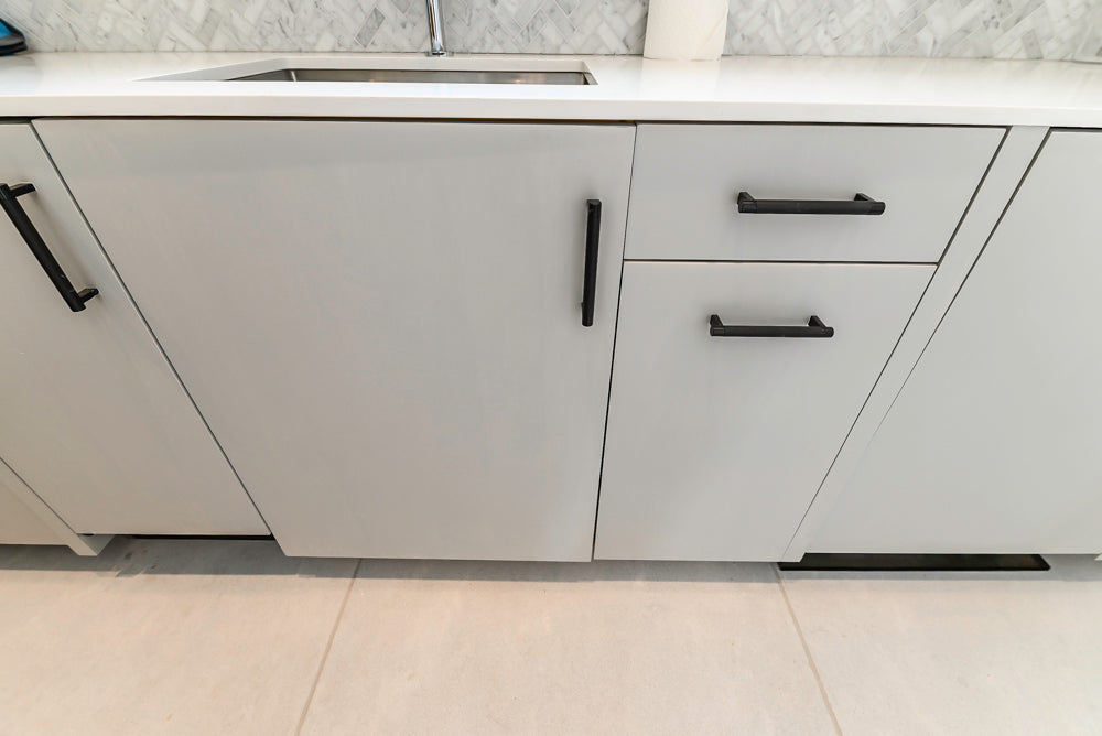 Custom Modern Light Grey Pantry with White Stone Countertops and Stainless Steel Sink