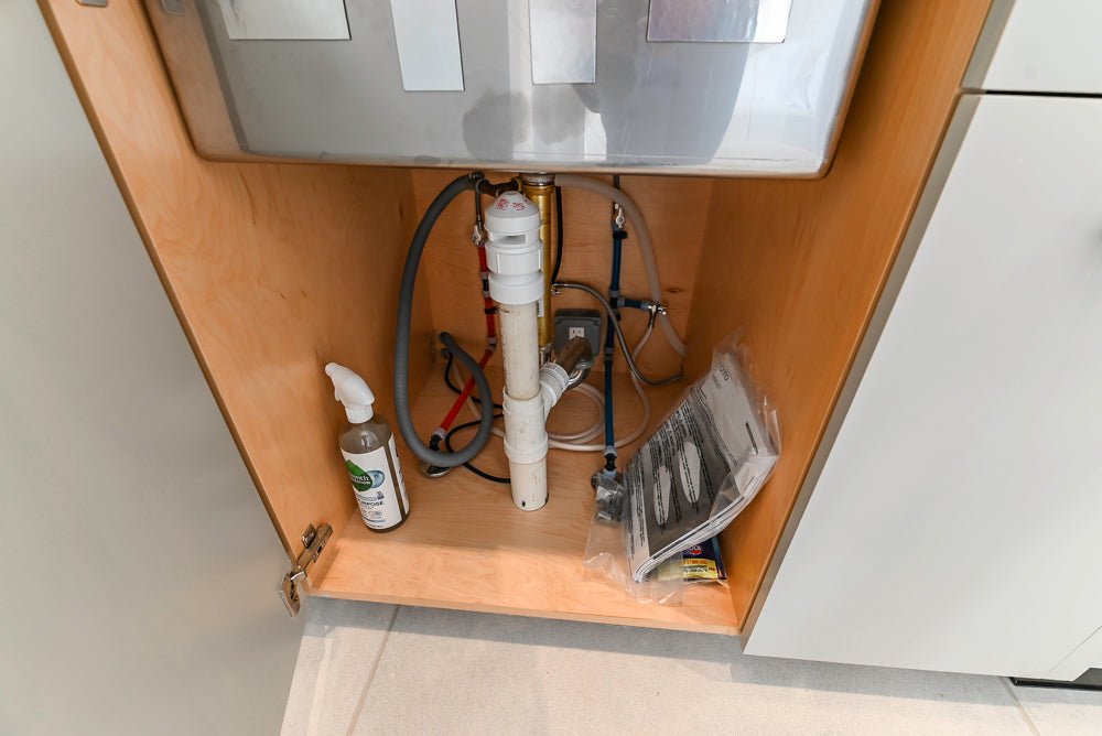 Custom Modern Light Grey Pantry with White Stone Countertops and Stainless Steel Sink