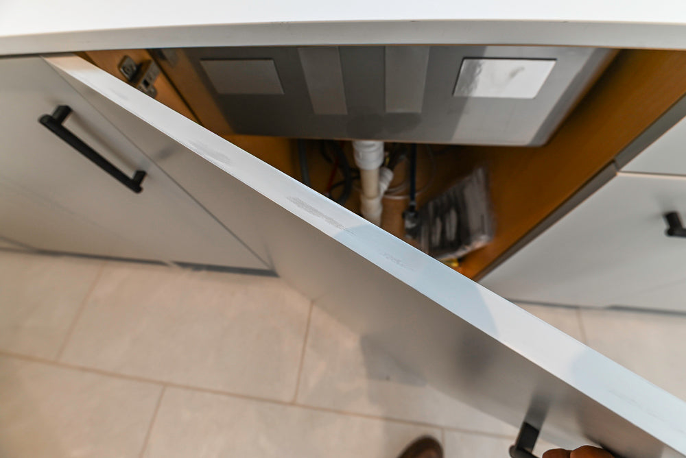Custom Modern Light Grey Pantry with White Stone Countertops and Stainless Steel Sink
