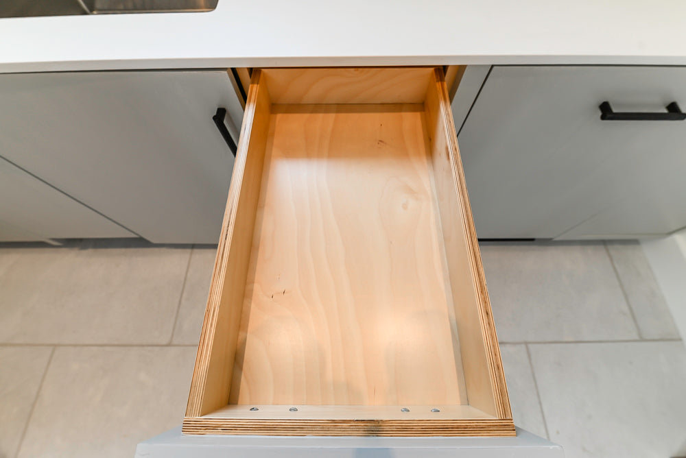 Custom Modern Light Grey Pantry with White Stone Countertops and Stainless Steel Sink